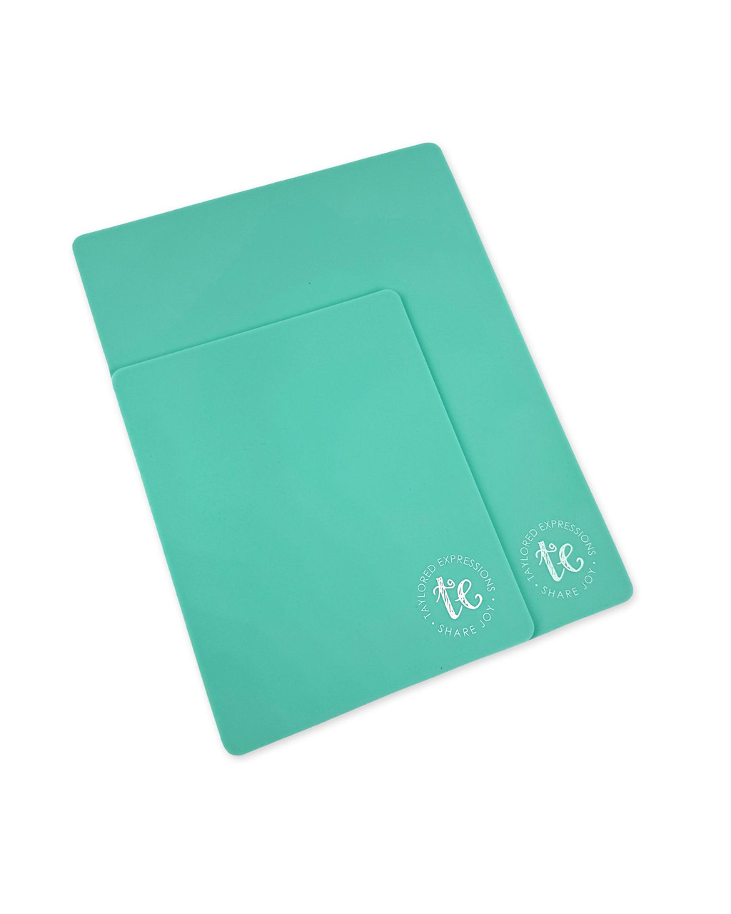 Image of two mirror mats used for papercrafting.